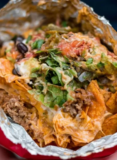 Delicious camping tacos prepared over a campfire in the great outdoors.