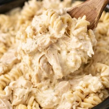 Delicious Crockpot Garlic Parmesan Chicken Pasta served in a bowl.