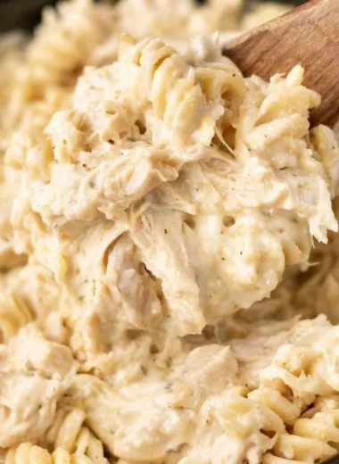 Delicious Crockpot Garlic Parmesan Chicken Pasta served in a bowl.