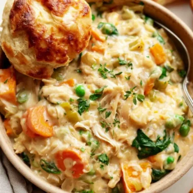 Homemade crustless chicken pot pie served in a bowl with vegetables