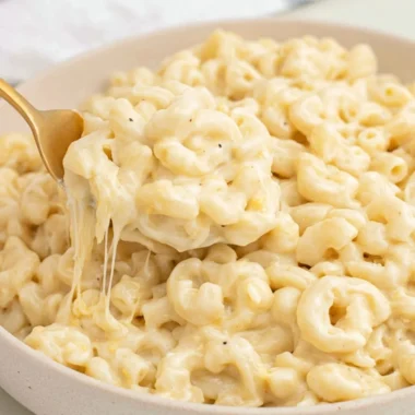 Greek Yogurt Mac and Cheese topped with herbs and spices
