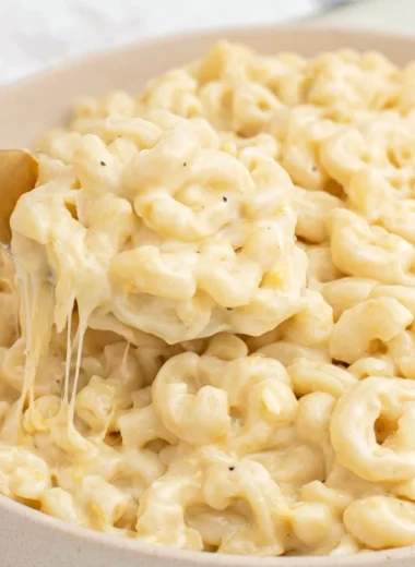 Greek Yogurt Mac and Cheese topped with herbs and spices