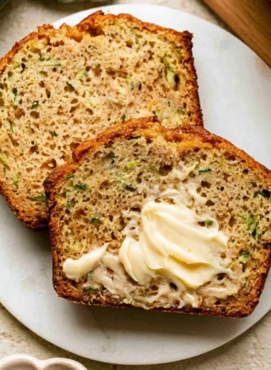 Delicious Greek Yogurt Zucchini Bread freshly baked with green zucchini
