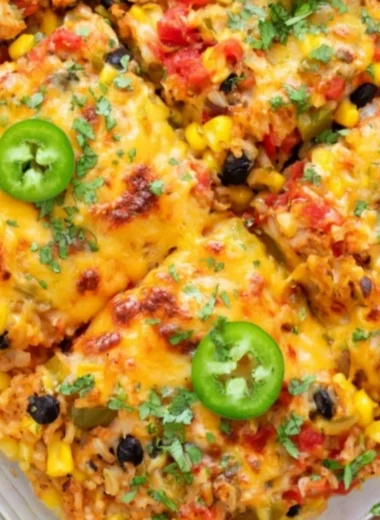 Healthy vegetarian rice and bean casserole served in a dish.