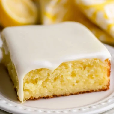 Deliciously moist lemonade cake topped with lemon frosting and fresh zest.