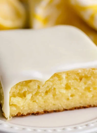 Deliciously moist lemonade cake topped with lemon frosting and fresh zest.