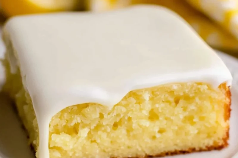 Deliciously moist lemonade cake topped with lemon frosting and fresh zest.