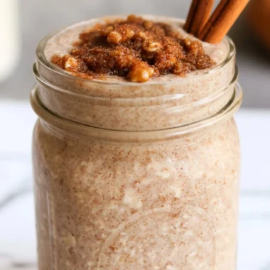 Bowl of brown sugar overnight oats topped with fresh fruit and nuts