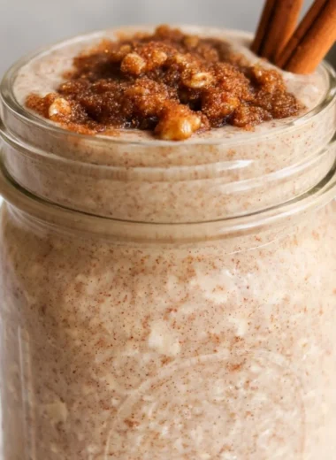 Bowl of brown sugar overnight oats topped with fresh fruit and nuts