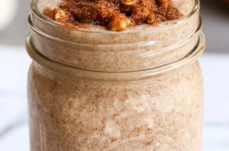 Bowl of brown sugar overnight oats topped with fresh fruit and nuts