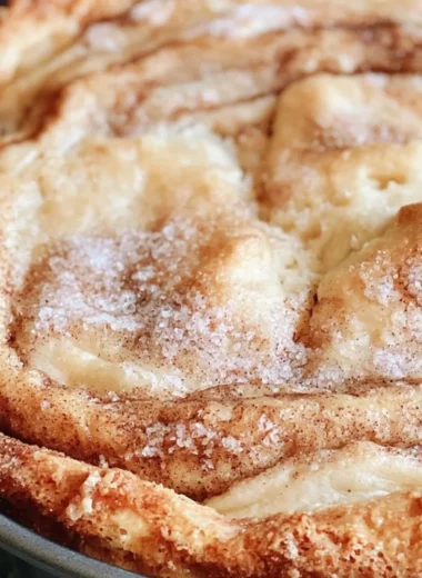 Deliciously moist Cinnamon Swirl Coffee Cake with a sugary cinnamon topping