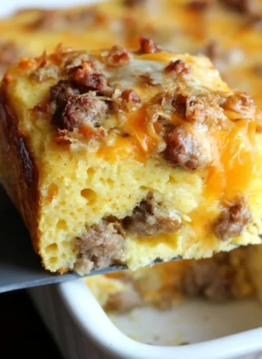 Delicious sausage cornbread casserole with eggs, cheese, and herbs