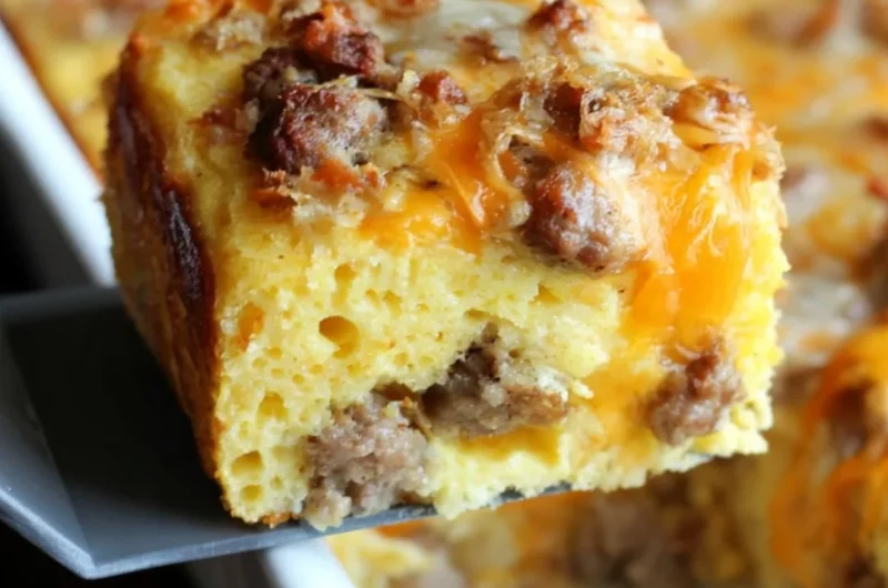 Delicious sausage cornbread casserole with eggs, cheese, and herbs