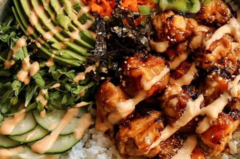 Delicious sticky honey ginger chicken bowls served with vegetables and rice